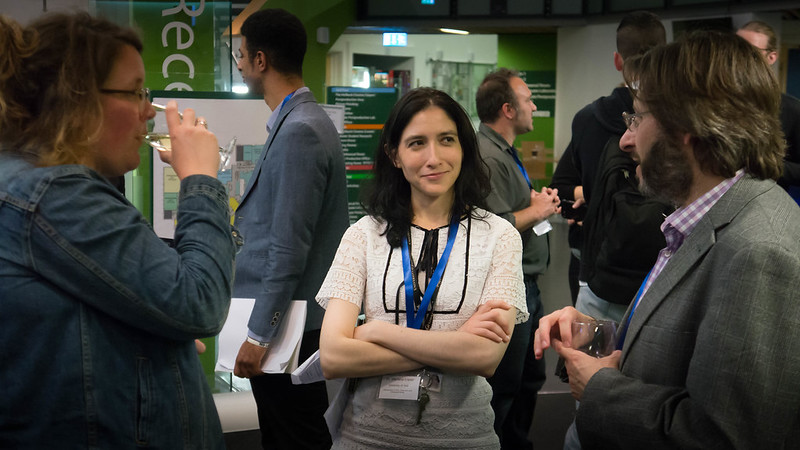 Mariana López talking to keynote speaker Howard Bargroff