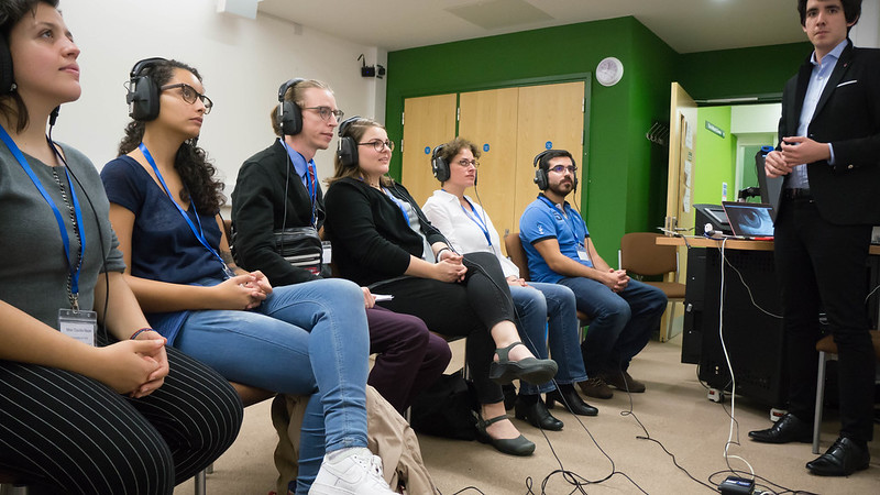 Cesar Portillo's tutorial with audience listening to headphones