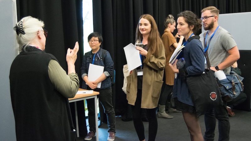 Poster presentation with several people